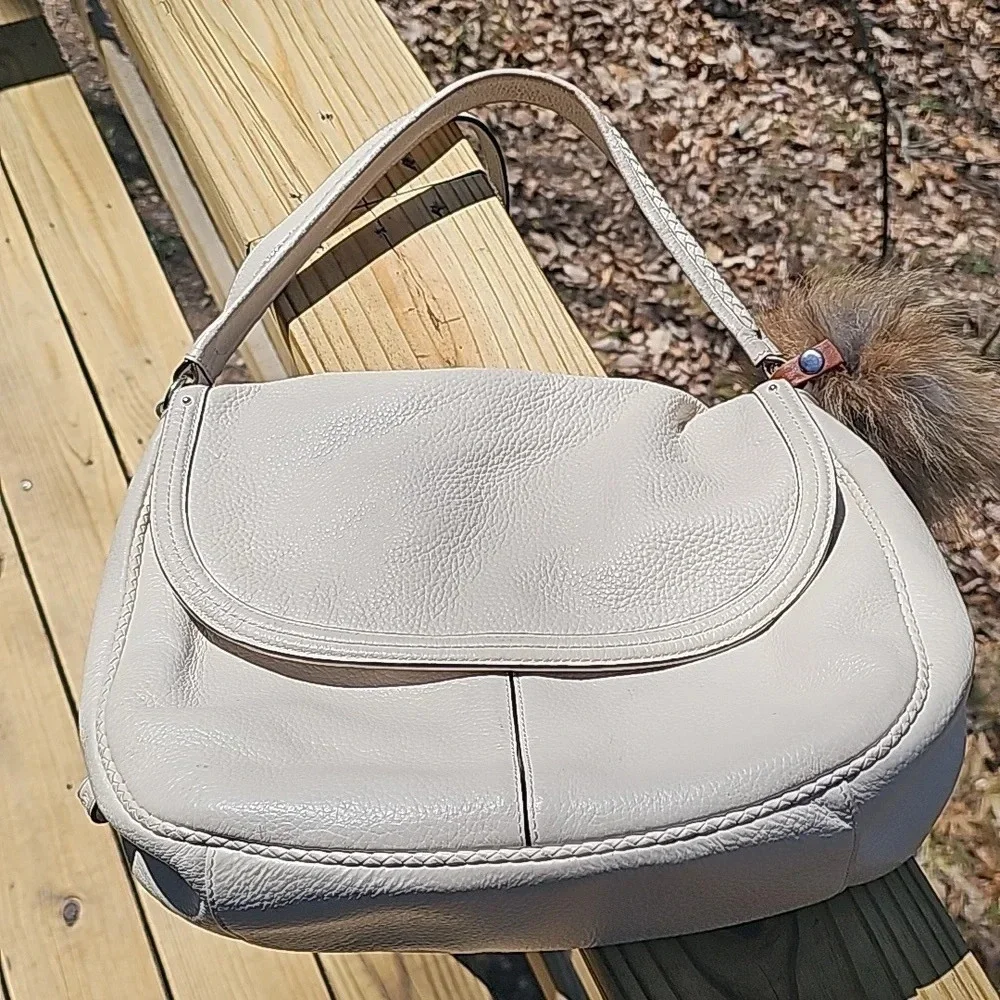 Cole Haan crossbody with fox pom